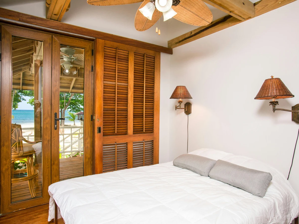 Feature wall painting Hereford, rustic cabin style bedroom by Hereford Painters