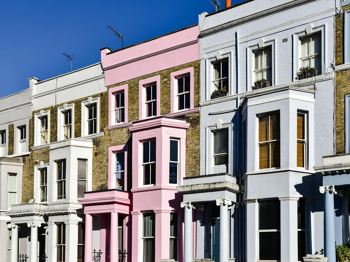 Colourful front door painting on London terraced houses by Hereford Painters