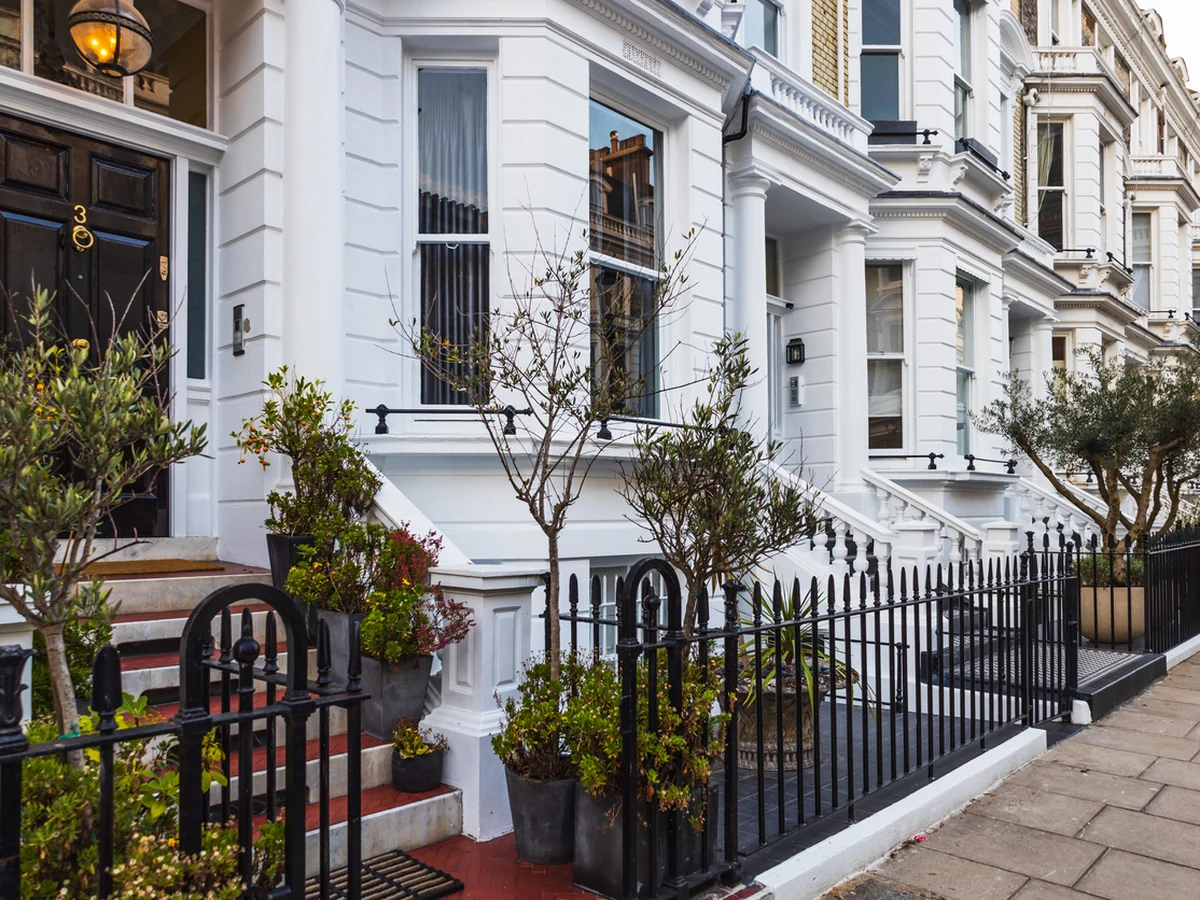Exterior painting of white Victorian townhouses in Hereford by Hereford Painters