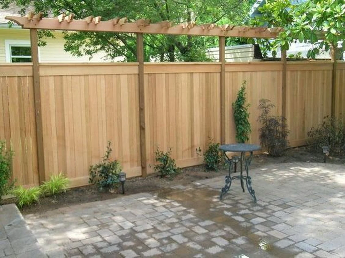Fence and shed painting in Hereford by Hereford Painters, tall wooden garden fence