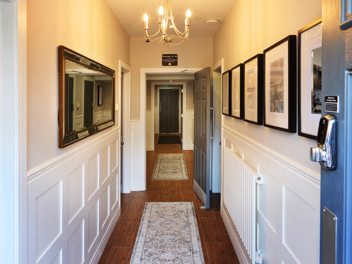Elegant hallway wallpapering in a period property in Hereford by Hereford Painters