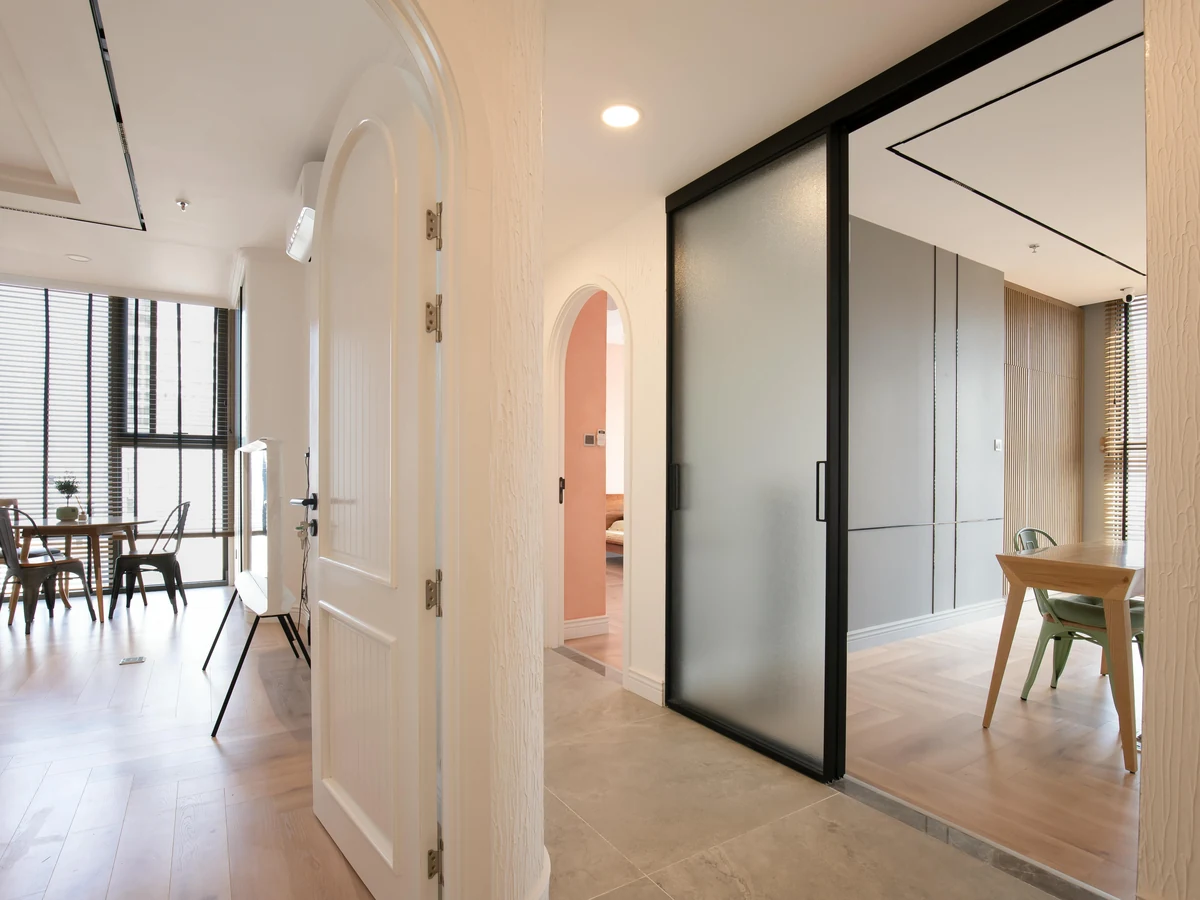 Modern hallway with arched entrance painted by Hereford Painters in Hereford