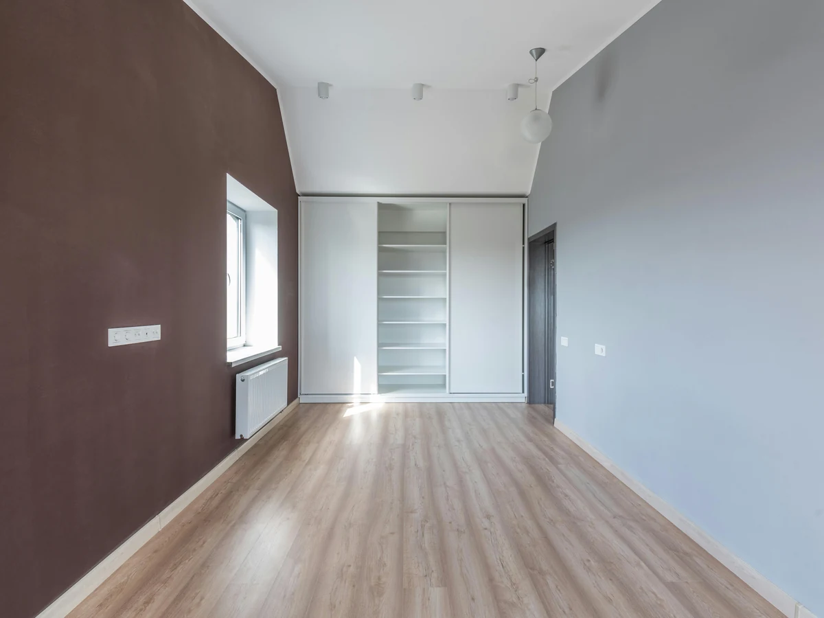 Interior room painted in brown and grey tones by Hereford Painters