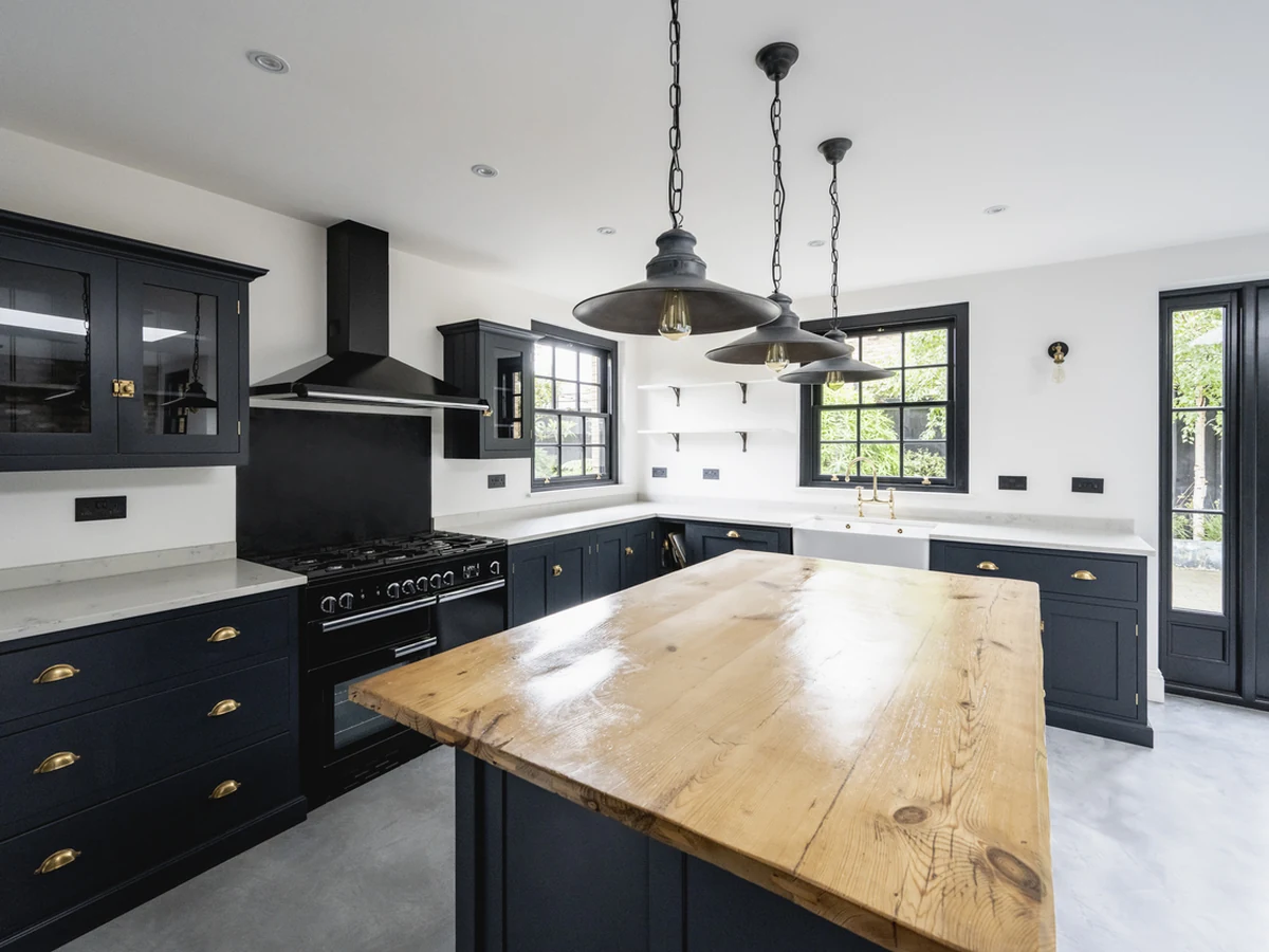 Spacious dark navy kitchen cabinets painted by Hereford Painters