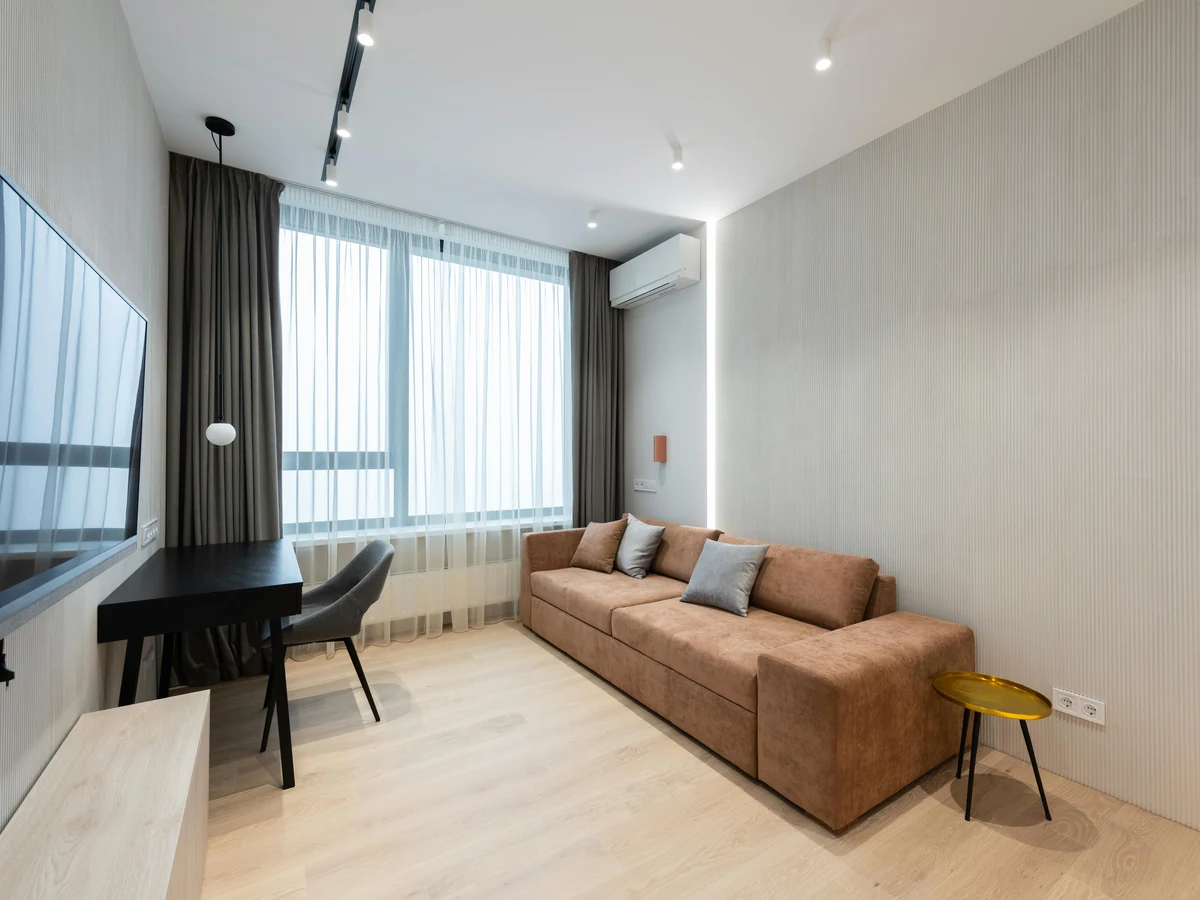 Modern living room painting in Hereford, lounge with brown tones by Hereford Painters