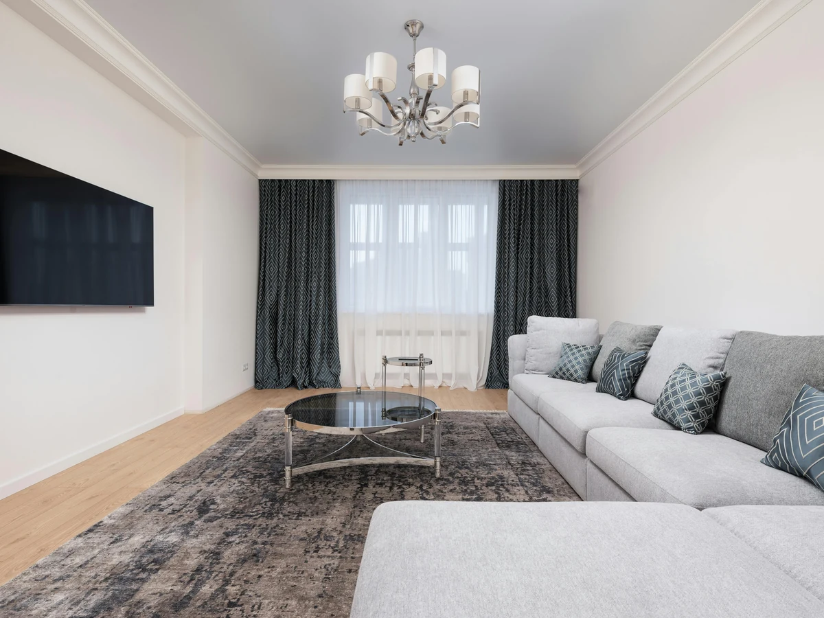 Living room painting in Hereford by Hereford Painters, white lounge with grey accents professionally decorated