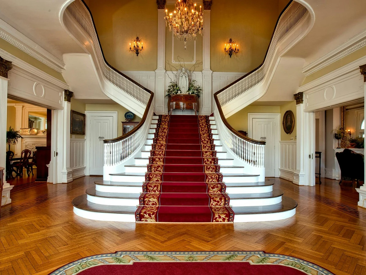 Grand sweeping double staircase painting in Hereford by Hereford Painters, professional decorators