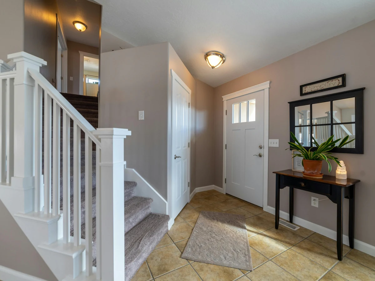 Staircase painting in a hallway with white finish in Hereford city centre by Hereford Painters