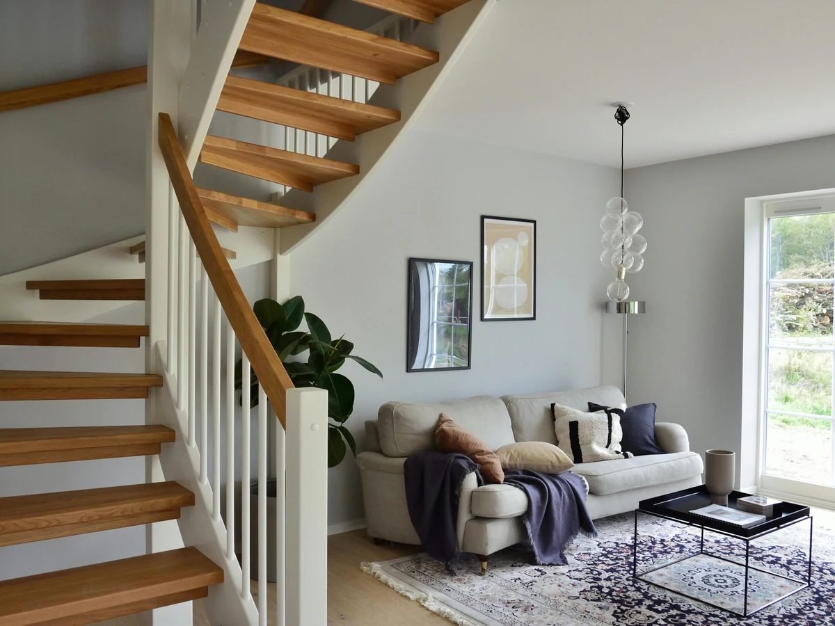 Varnished open tread staircase painting by Hereford Painters in Hereford