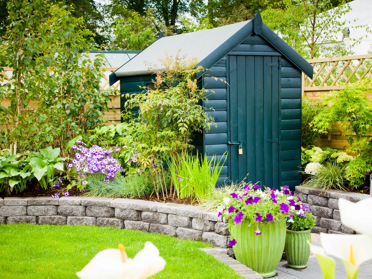 Dark teal garden shed painting in Hereford by Hereford Painters